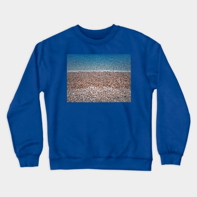 Pebble rocks beach Crewneck Sweatshirt by psychoshadow